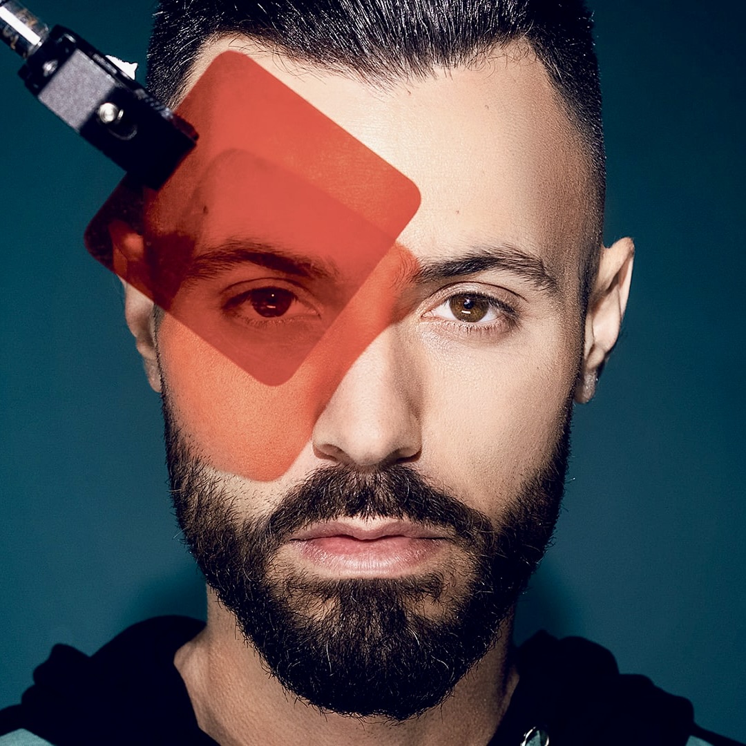 Portrait of music producer Yarden “JORDi” Peleg in a studio setting, used with his testimonial praising Sonisto’s plugin management features.